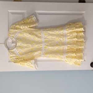 Boutique  Brand just me yellow and white dress size small lined ruffle hem